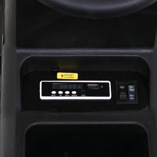 Zielony samochodzik elektryczny dla dziecTraktor Titanium z przyczepą.webp