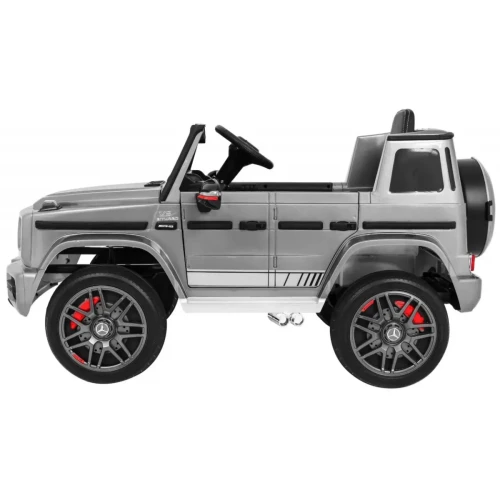 Srebrne auto na akumulator mercedes Mercedes AMG G63.webp