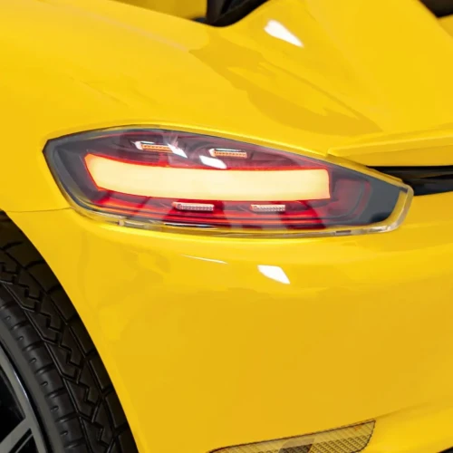 Żółty samochód elektryczny dla dziecka Porsche Spyder RS 718.webp