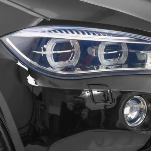 Czarny samochodzik elektryczny dla  dzieci BMW X6M.webp