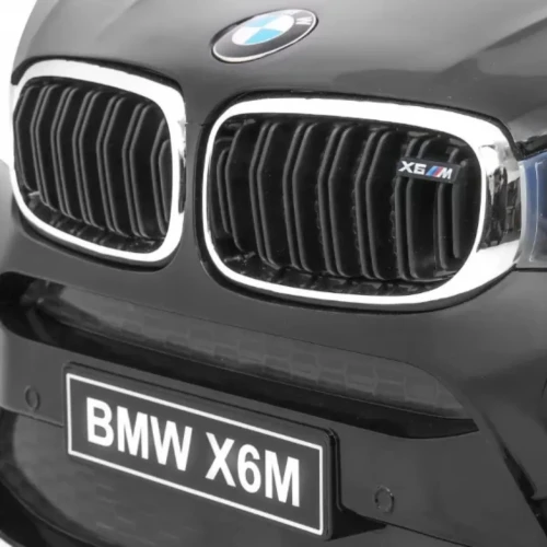 Czarny samochód elektryczny dla dziecka BMW X6M.webp