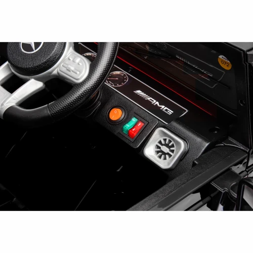Mercedes AMG G63 z Licencją 4x4, 4x30W 12V 7Ah - Czarny - kierownica i przycisk start.webp