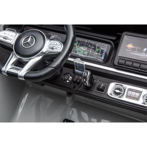 Samochód Mercedes G63 XXL 4x4 dla dzieci - czarny - kierownica i skrzynia biegów.webp