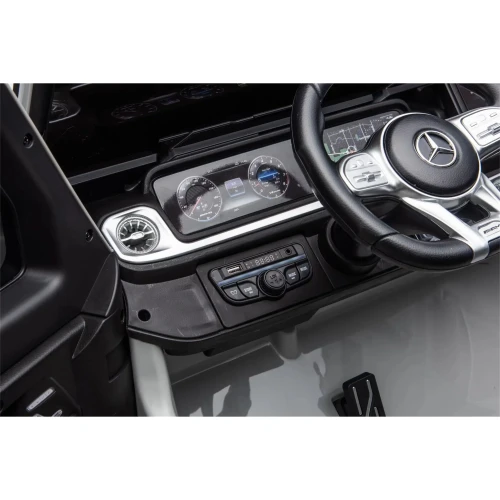 Samochód Mercedes G63 XXL 4x4 dla dzieci - czarny - panel audio.webp