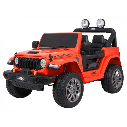 Auto elektryczne dla dzieci Jeep Rubicon od przodu z boku – sportowa maska z oznaczeniem 392, grill Jeep i terenowe koła w kolorze pomarańczowym.webp