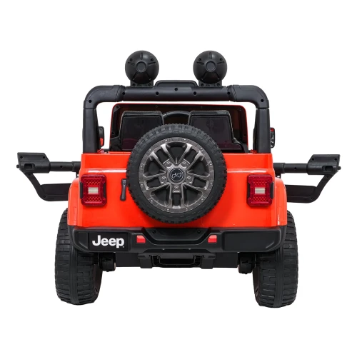 Widok od tyłu na jeżdżący samochód Jeep Rubicon – pełnowymiarowe koło zapasowe, czerwone światła stop i reflektory na dachu w pomarańczowym aucie dla dzieci.webp