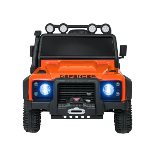 Włączone reflektory LED z przodu – pomarańczowy Land Rover Defender 110 SVX Concept, auto elektryczne na akumulator dla dzieci.webp