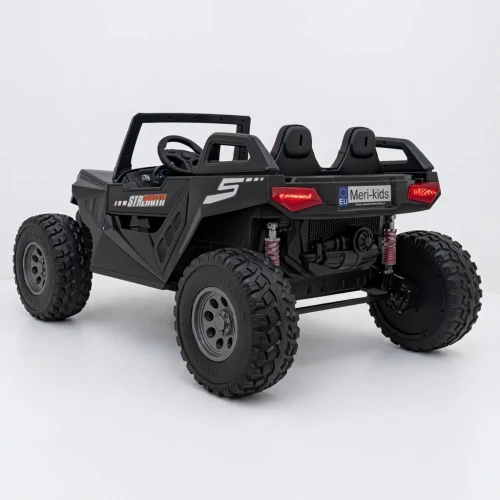 Ujęcie tyłu i boku z napisem STRENGTH i podświetlonymi lampami LED – czarne buggy Clash Strong 4x4 na akumulator dla dzieci.webp