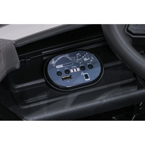 Panel audio z portem USB, odtwarzaczem MP3 i Bluetooth – deska rozdzielcza czarnego Volkswagena ID. Buzz na akumulator dla dzieci.webp