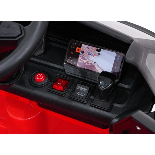 Ekran multimedialny z nawigacją, włącznik i przełącznik prędkości – kokpit czerwonego Volkswagena ID. Buzz na akumulator dla dzieci.webp