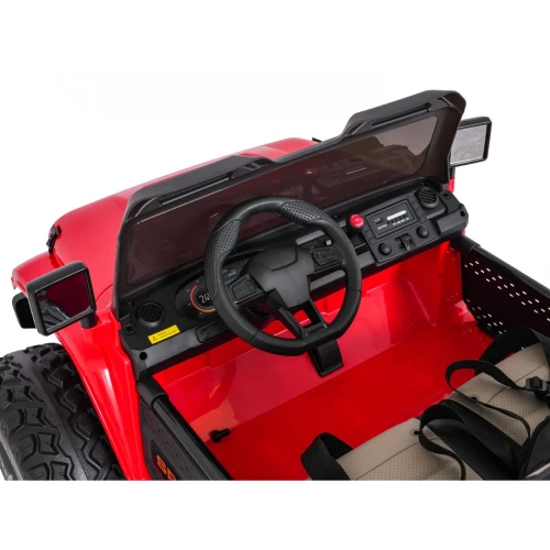 Kokpit z kierownicą, lusterkami i przyciemnianą szybą – wnętrze czerwonego Extreme Sport 4x4, auto elektryczne na akumulator dla dzieci.webp