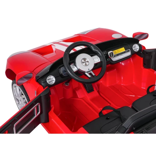 Kierownica z logo Ford GT, zegary i pedał gazu – kokpit czerwonego Forda GT na akumulator dla dzieci.webp