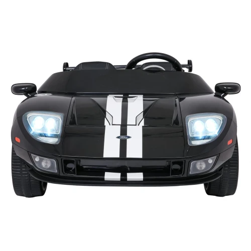 Widok z przodu z podświetlonymi reflektorami LED – czarny Ford GT, samochód na akumulator dla dzieci.webp