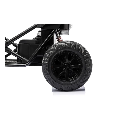 Tylne koło EVA z czarną felgą i amortyzator ze sprężyną – zbliżenie zawieszenia białego Buggy Sport OUTLAND 4x4 na akumulator dla dzieci.webp