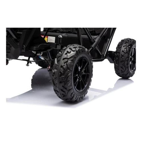 Koło EVA z terenowym bieżnikiem i czarną felgą – zbliżenie czarnego Buggy Sport Outland 4x4 na akumulator dla dzieci.webp