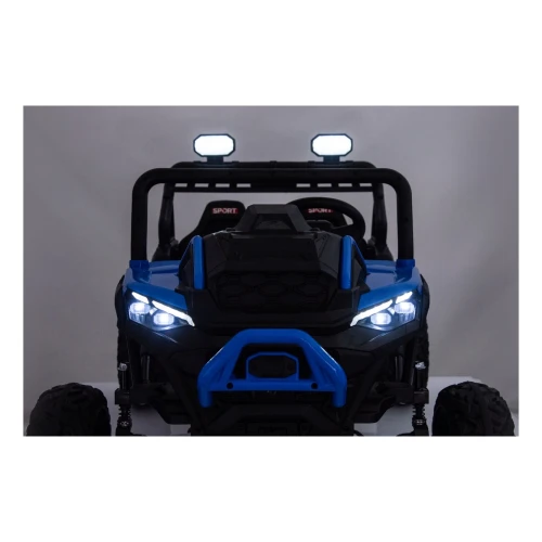 Świecące reflektory LED i lampy na dachu nocą – przód niebieskiego buggy Sport Outland 4x4, efektowne oświetlenie auta na akumulator dla dzieci.webp